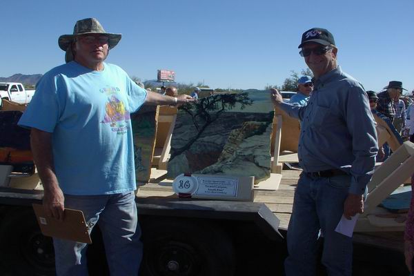 Artist Mark Goldberg posing with the Winner of his Rock Painting