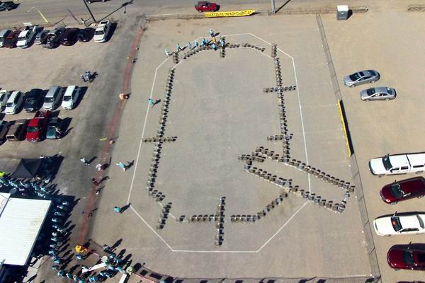 Letter Q identical to rooftop of QIA building before 631 people entered it