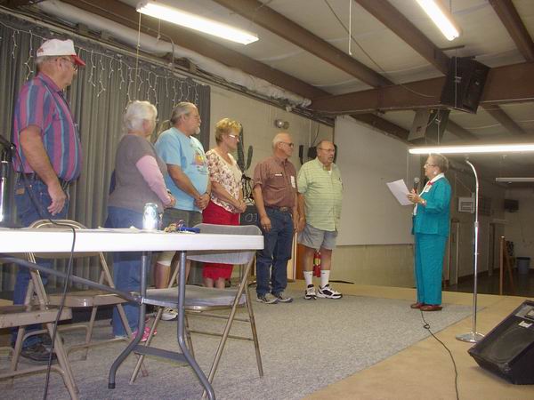 Alva & Bob being sworn in by Arlea to the QIA Board