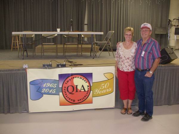 Howard & Sandy at the 50th Anniversary Banner of the QIA