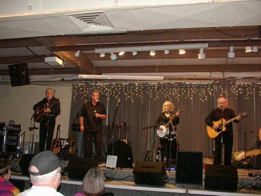 New Christy Minstrels on left side stage at the Q