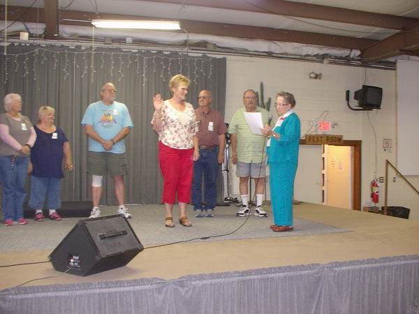 Sandy Andreasen getting sworn in to QIA Presidency by Arlea Long