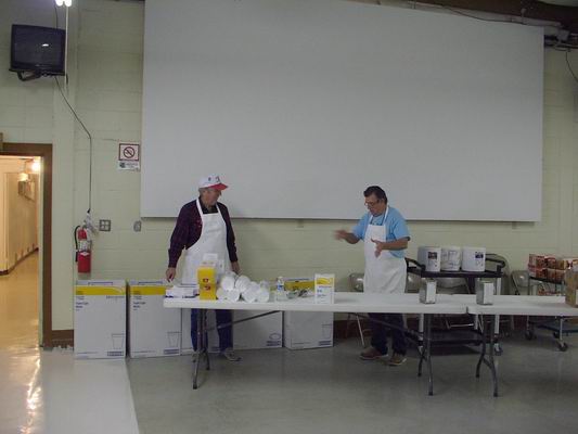 Howard & John getting ready to serve the volunteers